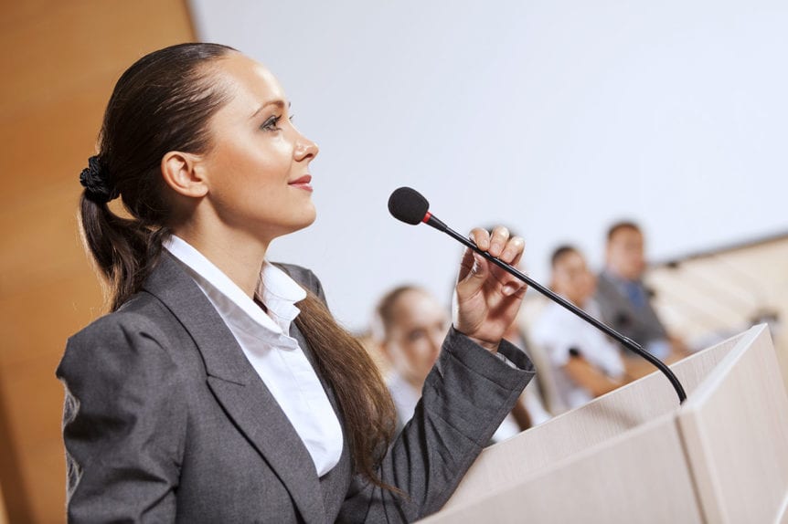 Woman presenting to an audience